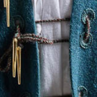 Fastenings: leather laces with brass points